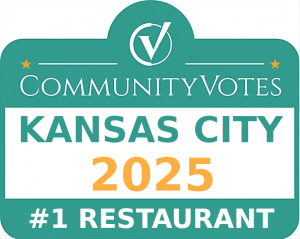 Jazz - A Louisiana Kitchen A teal and white badge reads "CommunityVotes Kansas City 2025 #1 Restaurant" with a check mark logo above the text. Kansas City, Columbia, cajun food restaurant near me